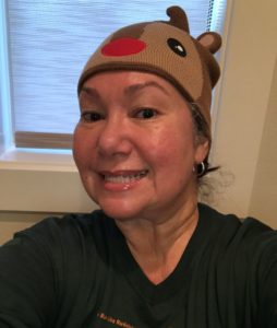 Selfie of Michele Marshall, ZAG Business Strategist, wearing a reindeer beanie hat